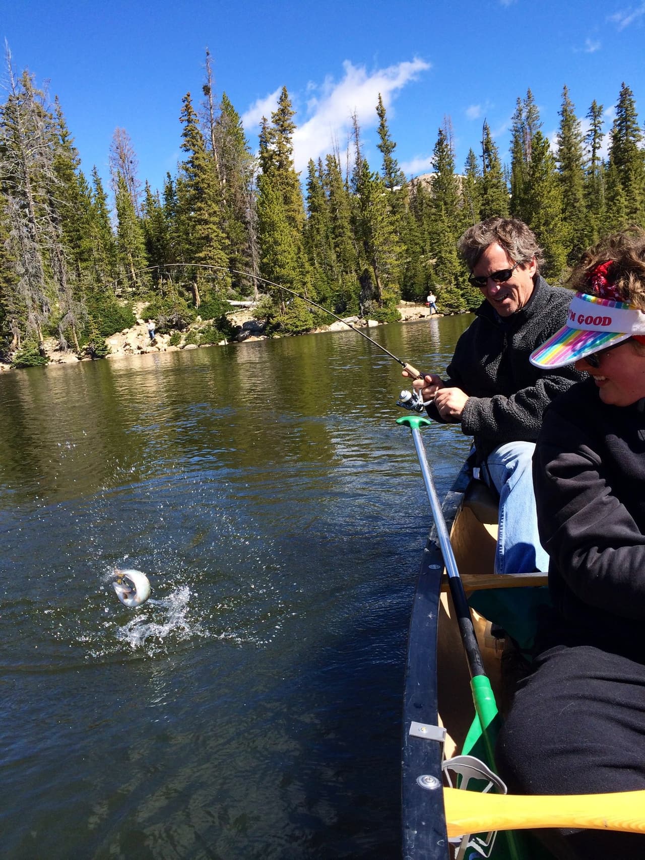 A fishing moment on a mountain lake